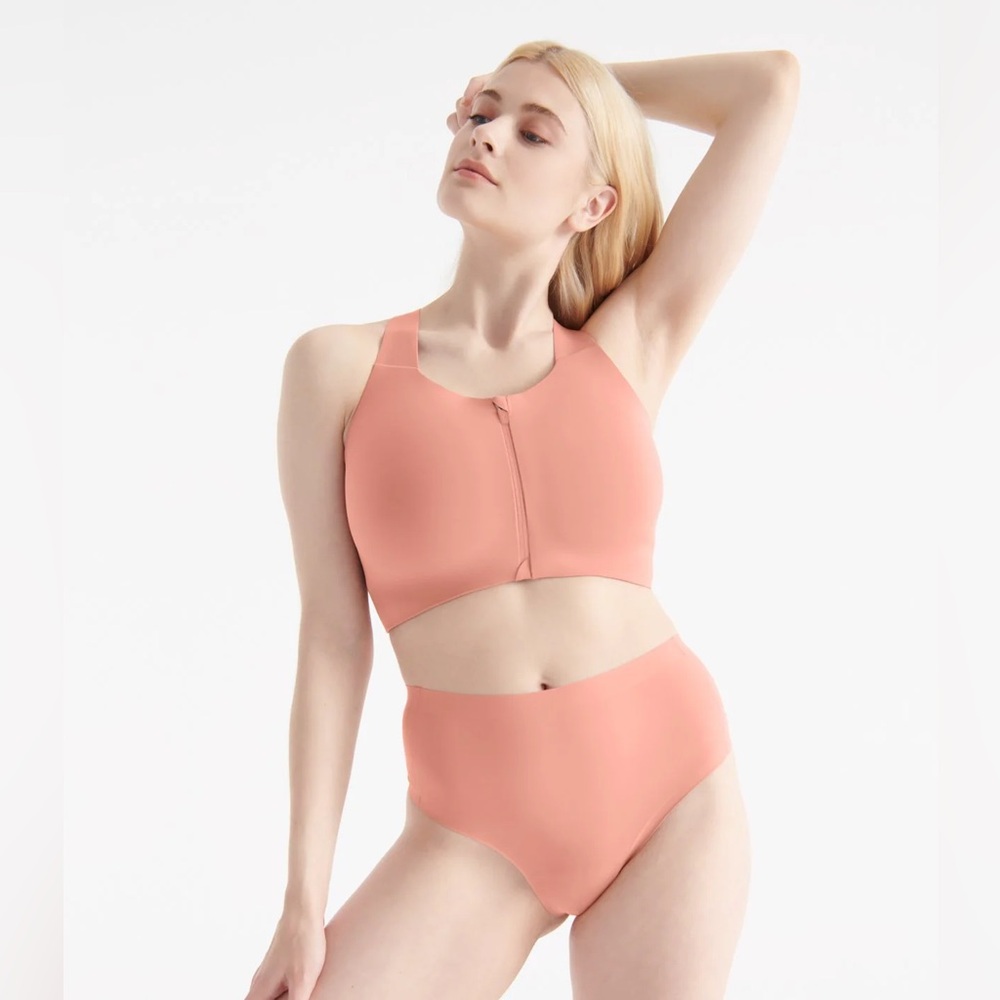 knix Front-Zip High-Neck Sports Bra in Coral Peach